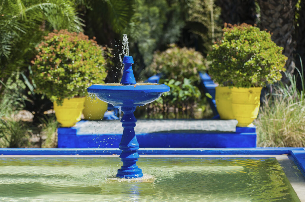 Blue fountain at Majorelle Garden, aka Garden of Yves Saint Laurent, Marrakech (Marrakesh), Morocco,